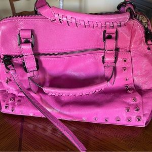 Fun, bright pinkish purple Elliot Luca handbag.